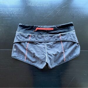 Lululemon Speed Short
Heathered Black Very Light Flare Neon Trim size 6 (2.5”)